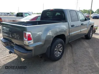 2008 Mitsubishi Raider LS z VIN 1Z7HC28K68S619590, wystawiony jako IAAI lot #42305142 z przebiegiem 185 622 mil mil oraz . Historia ofert i sprzedaży dostępna na DreamBid. Obrazek 4.