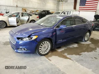 2013 Ford Fusion SE Hybrid z VIN 3FA6P0LU7DR104050, wystawiony jako Copart lot #63366305 z przebiegiem 182 115 mil mil oraz Czysty tytuł • Clean title. Historia ofert i sprzedaży dostępna na DreamBid. Obrazek 1.