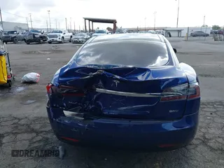 2016 Tesla Model S 90D with VIN 5YJSA1E22GF154873, listed as a IAAI auction lot 41950274 with 82,649 mi miles and . Bid and sale history available at DreamBid. Image 16.