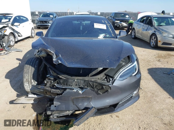 2018 Tesla Model S 75D with VIN 5YJSA1E49JF294699, listed as a IAAI auction lot 41567770 with 34,644 mi miles and . Bid and sale history available at DreamBid. Image 12.