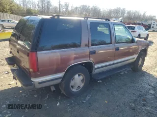 1997 GMC Yukon with VIN 1GKEK13R1VJ702558, listed as a Copart auction lot 85930054 with 165,837 mi miles and Salvage Title. Bid and sale history available at carsss.com. Image 3.