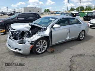 2014 Cadillac XTS Luxury with VIN 2G61M5S32E9157140, listed as a Copart auction lot 63097355 with 49,137 mi miles and Clean title. Bid and sale history available at DreamBid. Image 1.