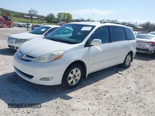2006 Toyota Sienna XLE with VIN 5TDZA22C06S576958, listed as a IAAI auction lot 41978892 with 257,598 mi miles. Bid and sale history available at carsss.com. Image 2.