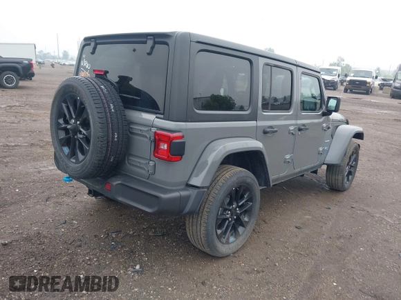 2023 Jeep Wrangler Sahara with VIN 1C4JJXP6XPW698886, listed as a IAAI auction lot 42439690 with 41,787 mi miles and . Bid and sale history available at DreamBid. Image 4.