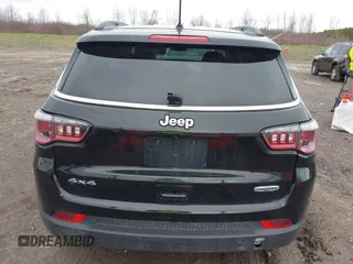 2018 Jeep Compass Altitude with VIN 3C4NJDBB2JT108035, listed as a IAAI auction lot 42013400 with 179,886 mi miles and . Bid and sale history available at carsss.com. Image 16.