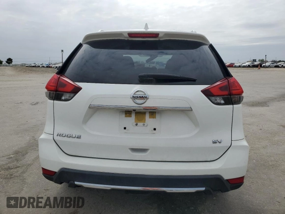 2017 Nissan Rogue SV z VIN JN8AT2MT9HW143571, wystawiony jako Copart lot #53751385 z przebiegiem 105 333 mil mil oraz Szkoda całkowita • Salvage title. Historia ofert i sprzedaży dostępna na DreamBid. Obrazek 6.