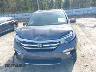 2017 Honda Pilot Touring with VIN 5FNYF5H9XHB046479, listed as a IAAI auction lot 41941449 with 162,554 mi miles. Bid and sale history available at carsss.com. Image 12.