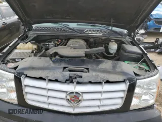 2004 Cadillac Escalade z VIN 1GYEC63T64R260162, wystawiony jako Copart lot #54725685 z przebiegiem 223 615 mil mil oraz Szkody całkowita. Historia ofert i sprzedaży dostępna na DreamBid. Obrazek 12.
