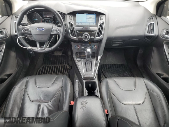 2017 Ford Focus Titanium with VIN 1FADP3J27HL298402, listed as a Copart auction lot 57340875 with 110,172 mi miles and Salvage title. Bid and sale history available at DreamBid. Image 8.