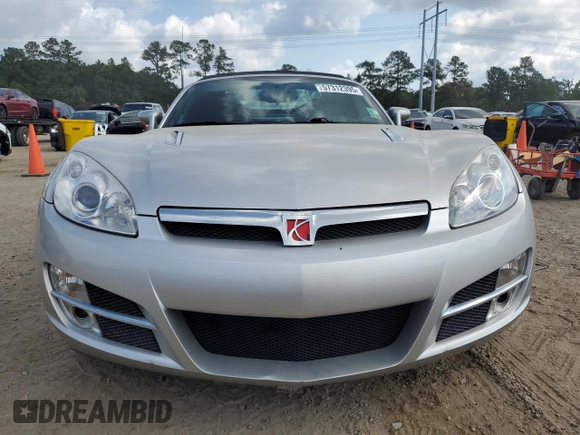 2007 Saturn Sky z VIN 1G8MB35B57Y135858, wystawiony jako Copart lot #57312395 z przebiegiem 46 140 mil mil oraz Szkoda całkowita • Salvage title. Historia ofert i sprzedaży dostępna na DreamBid. Obrazek 5.
