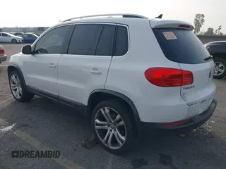 2012 Volkswagen Tiguan SE z VIN WVGAV7AX6CW535969, wystawiony jako IAAI lot #41464523 z przebiegiem 138 858 mil mil oraz . Historia ofert i sprzedaży dostępna na DreamBid. Obrazek 3.