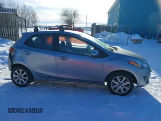 2013 Mazda 2 Touring z VIN JM1DE1LYXD0153291, wystawiony jako IAAI lot #41671574 z przebiegiem Nie podano mil oraz . Historia ofert i sprzedaży dostępna na DreamBid. Obrazek 12.