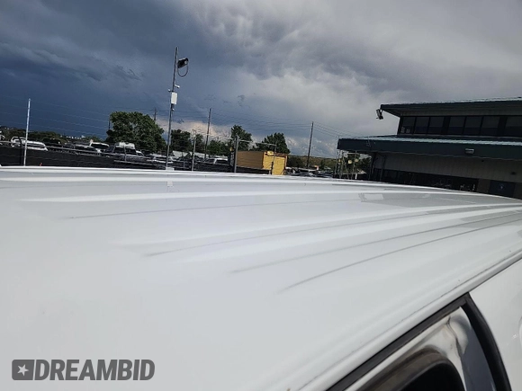 2021 Chevrolet Express Cargo with VIN 1GCWGAFP2M1303233, listed as a IAAI auction lot 42731173 with 57,034 mi miles and . Bid and sale history available at DreamBid. Image 13.
