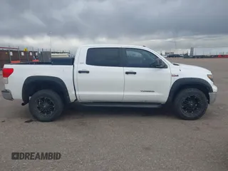 2012 Toyota Tundra 4WD Truck with VIN 5TFDW5F10CX223471, listed as a IAAI auction lot 41839687 with 249,246 mi miles. Bid and sale history available at carsss.com. Image 13.