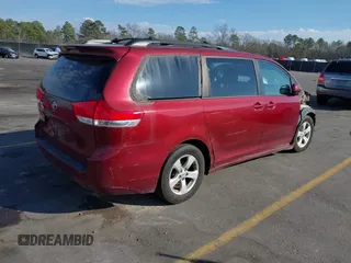2012 Toyota Sienna LE AAS with VIN 5TDKK3DCXCS227268, listed as a IAAI auction lot 41504555 with 268,609 mi miles. Bid and sale history available at carsss.com. Image 4.
