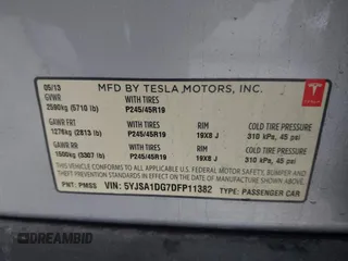 2013 Tesla Model S with VIN 5YJSA1DG7DFP11382, listed as a IAAI auction lot 42056169 with 126,975 mi miles. Bid and sale history available at carsss.com. Image 9.