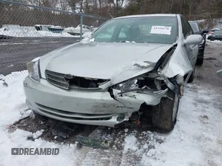 2004 Toyota Camry LE with VIN 4T1BF32K64U588682, listed as a IAAI auction lot 41520570 with 112,646 mi miles. Bid and sale history available at carsss.com. Image 6.