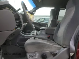 1999 Ford Expedition XLT with VIN 1FMPU18L6XLA61106, listed as a Copart auction lot 62688735 with 105,551 mi miles and Salvage title. Bid and sale history available at DreamBid. Image 7.