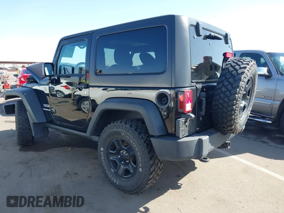 2014 Jeep Wrangler Sport with VIN 1C4AJWAG7EL100344, listed as a IAAI auction lot 42020438 with 87,279 mi miles and . Bid and sale history available at carsss.com. Image 3.