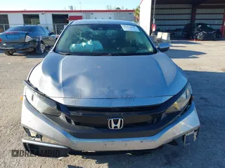 2020 Honda Civic LX with VIN 19XFC2F63LE004953, listed as a IAAI auction lot 41824922 with 71,458 mi miles and . Bid and sale history available at DreamBid. Image 12.