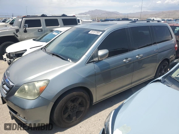 2005 Honda Odyssey Touring z VIN 5FNRL38805B131416, wystawiony jako Copart lot #59157395 z przebiegiem 263 087 mil mil oraz Szkoda całkowita • Salvage title. Historia ofert i sprzedaży dostępna na DreamBid. Obrazek 1.