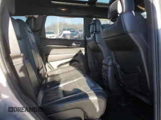 2014 Jeep Grand Cherokee Overland with VIN 1C4RJFCG2EC281062, listed as a Copart auction lot 47099225 with 127,660 mi miles and Salvage Title. Bid and sale history available at carsss.com. Image 12.