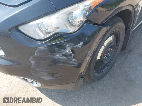 2014 Infiniti QX70 with VIN JN8CS1MW7EM410150, listed as a IAAI auction lot 39960321 with Not Provided miles and . Bid and sale history available at DreamBid. Image 6.