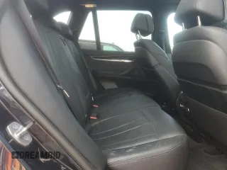 2017 BMW X5 xDrive35i z VIN 5UXKR0C57H0U52284, wystawiony jako Copart lot #60208755 z przebiegiem 156 706 mil mil oraz Szkoda całkowita • Salvage title. Historia ofert i sprzedaży dostępna na DreamBid. Obrazek 11.