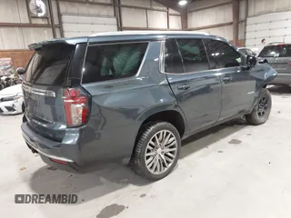 2021 Chevrolet Tahoe LT z VIN 1GNSKNKD5MR354265, wystawiony jako IAAI lot #42331890 z przebiegiem 106 250 mil mil oraz . Historia ofert i sprzedaży dostępna na DreamBid. Obrazek 4.