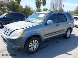 2006 Honda CR-V EX with VIN JHLRD68816C025041, listed as a IAAI auction lot 41963589 with 180,077 mi miles. Bid and sale history available at carsss.com. Image 6.