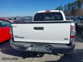 2014 Toyota Tacoma with VIN 5TFLU4EN1EX103052, listed as a IAAI auction lot 41653270 with 121,656 mi miles. Bid and sale history available at carsss.com. Image 16.