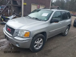 2004 GMC Envoy SLE with VIN 1GKDS13S442350938, listed as a IAAI auction lot 41790810 with 161,998 mi miles. Bid and sale history available at carsss.com. Image 2.