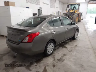 2013 Nissan Versa SV with VIN 3N1CN7AP2DL867060, listed as a IAAI auction lot 42315716 with 159,969 mi miles and . Bid and sale history available at DreamBid. Image 4.
