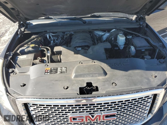 2015 GMC Yukon Denali with VIN 1GKS2CKJ9FR173812, listed as a Copart auction lot 72577144 with 207,940 mi miles and Salvage Title. Bid and sale history available at carsss.com. Image 13.