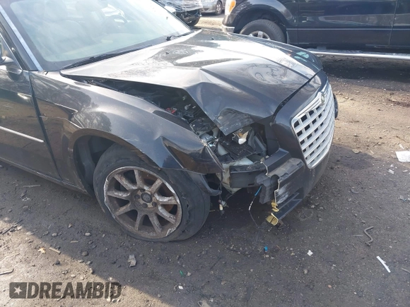 2009 Chrysler 300 Limited with VIN 2C3KA33V59H570460, listed as a IAAI auction lot 42017573 with 130,600 mi miles. Bid and sale history available at carsss.com. Image 6.