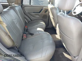 2004 Jeep Grand Cherokee with VIN 1J8GX48S24C266933, listed as a IAAI auction lot 41497122 with 200,899 mi miles and . Bid and sale history available at DreamBid. Image 8.