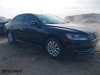 2014 Volkswagen Passat Wolfsburg Ed with VIN 1VWAS7A35EC094900, listed as a IAAI auction lot 42061090 with 115,897 mi miles. Bid and sale history available at carsss.com. Image 1.