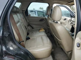 2005 Ford Escape Limited z VIN 1FMYU04135KB19386, wystawiony jako Copart lot #51686515 z przebiegiem Nie podano mil oraz Szkoda całkowita • Salvage title. Historia ofert i sprzedaży dostępna na DreamBid. Obrazek 10.