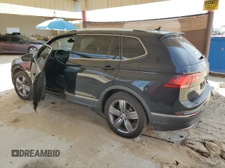 2020 Volkswagen Tiguan SE z VIN 3VV3B7AXXLM138188, wystawiony jako Copart lot #52787085 z przebiegiem 58 363 mil mil oraz Szkody całkowita. Historia ofert i sprzedaży dostępna na DreamBid. Obrazek 2.