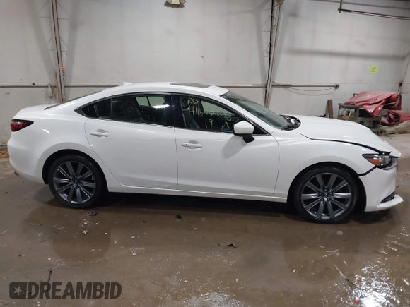 2019 Mazda 6 Grand Touring with VIN JM1GL1TYXK1505439, listed as a IAAI auction lot 41672678 with 52,990 mi miles and . Bid and sale history available at carsss.com. Image 13.