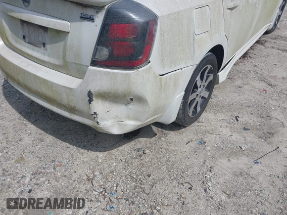 2012 Nissan Sentra SR z VIN 3N1AB6AP7CL697738, wystawiony jako IAAI lot #42358597 z przebiegiem Nie podano mil oraz . Historia ofert i sprzedaży dostępna na DreamBid. Obrazek 6.