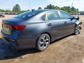 2021 Kia Forte LXS with VIN 3KPF24AD2ME273774, listed as a IAAI auction lot 41980949 with 48,883 mi miles and . Bid and sale history available at carsss.com. Image 4.