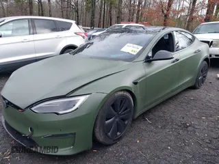 2022 Tesla Model S with VIN 5YJSA1E50NF487306, listed as a IAAI auction lot 41570528 with Not Provided miles and . Bid and sale history available at DreamBid. Image 20.