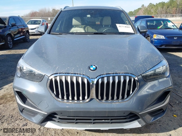 2021 BMW X1 xDrive28i with VIN WBXJG9C07M5T23053, listed as a IAAI auction lot 41774663 with 66,770 mi miles. Bid and sale history available at carsss.com. Image 12.