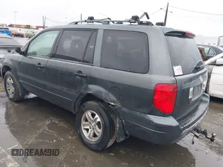 2005 Honda Pilot EX-L z VIN 2HKYF18745H567671, wystawiony jako IAAI lot #41577393 z przebiegiem 178 182 mil mil oraz . Historia ofert i sprzedaży dostępna na DreamBid. Obrazek 3.