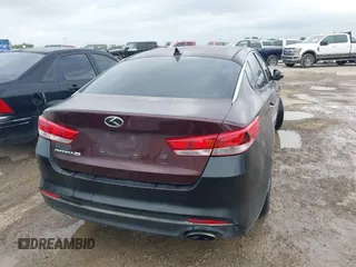 2016 Kia Optima LX with VIN 5XXGT4L3XGG027430, listed as a IAAI auction lot 41940146 with 75,456 mi miles and . Bid and sale history available at carsss.com. Image 16.