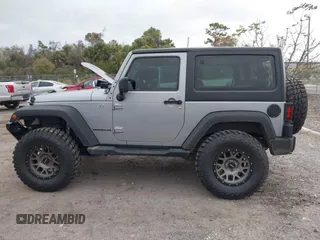 2014 Jeep Wrangler Sport with VIN 1C4AJWAG0EL265409, listed as a IAAI auction lot 41726935 with 78,547 mi miles and . Bid and sale history available at DreamBid. Image 15.
