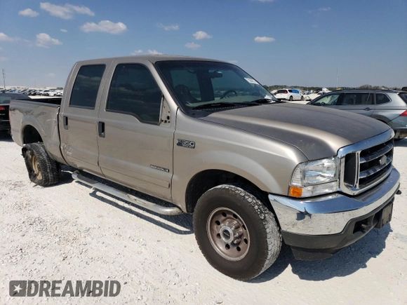 2002 Ford F-350 XL with VIN 3FTSW31F62MA15436, listed as a Copart auction lot 75384314 with 284,637 mi miles and Salvage Title. Bid and sale history available at DreamBid. Image 4.