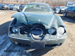 2005 Jaguar S-Type with VIN SAJWA01T95FN51551, listed as a IAAI auction lot 41637854 with 90,075 mi miles and . Bid and sale history available at DreamBid. Image 12.