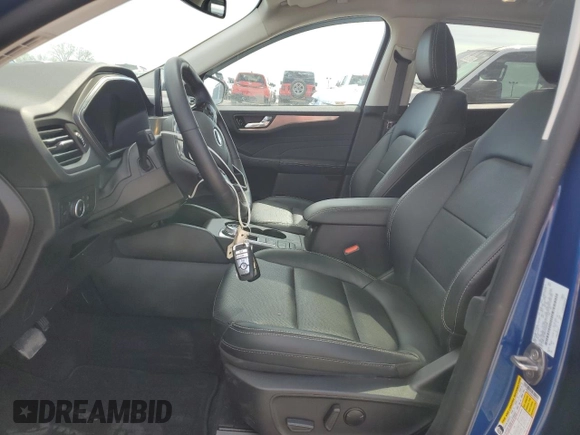 2022 Ford Escape Titanium with VIN 1FMCU9J99NUC00258, listed as a Copart auction lot 54133085 with 16,647 mi miles and Salvage title. Bid and sale history available at DreamBid. Image 7.